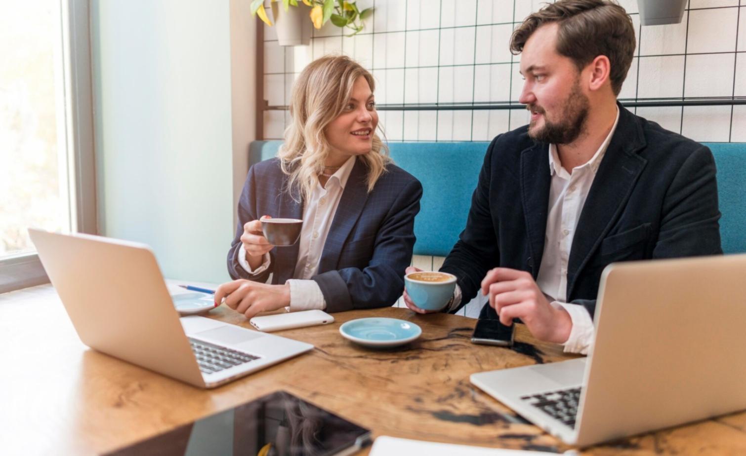 Professional presenting financial data and crowdfunding strategies to engaged business audience