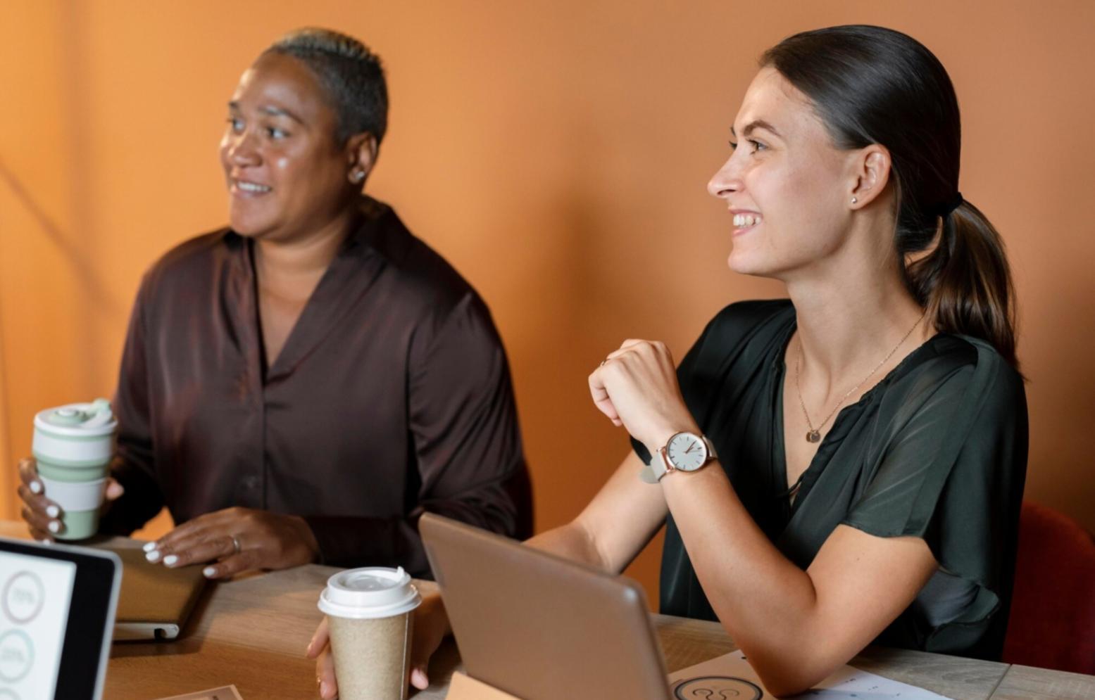 Students collaborating on financial planning exercises during workshop session